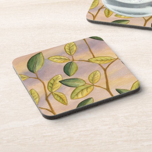 日没の背景に葉緑と黄色の コースター (左側)