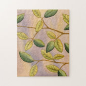 日没の背景に葉緑と黄色の ジグソーパズル (縦)