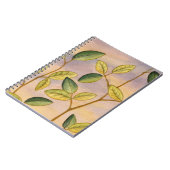 日没の背景に葉緑と黄色の ノートブック (左側)