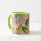 日没の背景に葉緑と黄色の マグカップ (正面左)