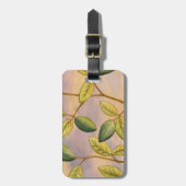 日没の背景に葉緑と黄色の ラゲッジタグ (正面縦)