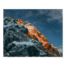 日没白熱［赤熱］光を放つ山