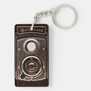 旧式なカメラのrolleicordのアール・デコ キーホルダー
