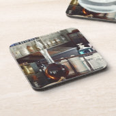 旧式な薬学のボトル コースター (左側)