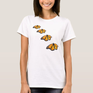 (昆虫)オオカバマダラ、モナーク飛んでいるTシャツ Tシャツ