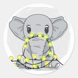 明かりの中で包まれたかわいいクリスマス象 ラウンドシール