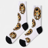 明るいお洒落緑色の目を持つ漫画の猫 ソックス (左)