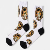 明るいお洒落緑色の目を持つ漫画の猫 ソックス (左)