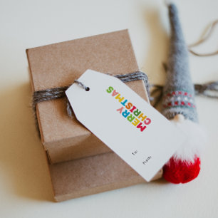 明るいカラフル陽気な聖降誕祭の行き来の ギフトタグ