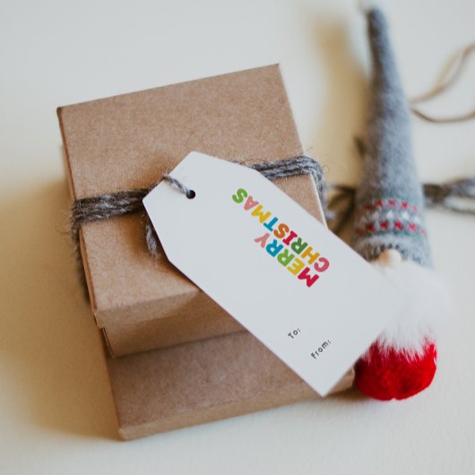 明るいカラフル陽気な聖降誕祭の行き来の ギフトタグ