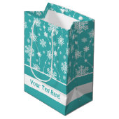 明るいティール（緑がかった色）ブルーウィンターホワイトスノーフレークパターン ミディアムペーパーバッグ (正面アングル)