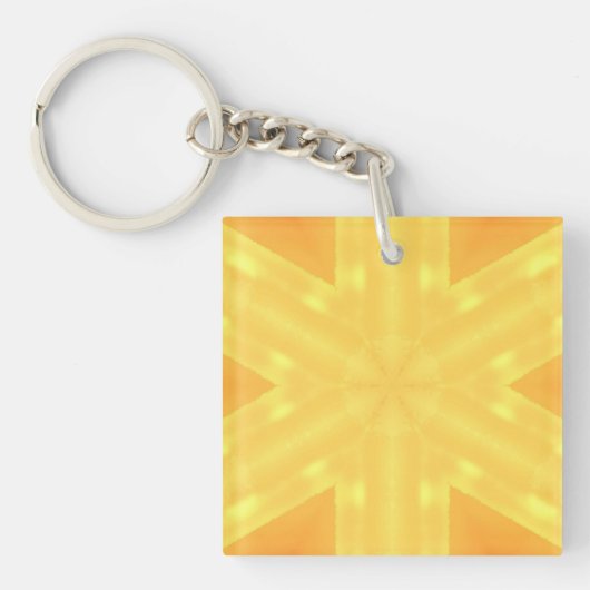 明るい日の出と線の万華鏡のように千変万化するパターン キーホルダー (正面)