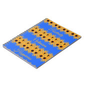 明るい日黄色の花オン王室のブルー ノートブック (左側)