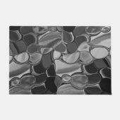 明るい灰色と暗い丸い形状。 ドアマット (正面)