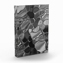 明るい灰色と暗い丸い形状。