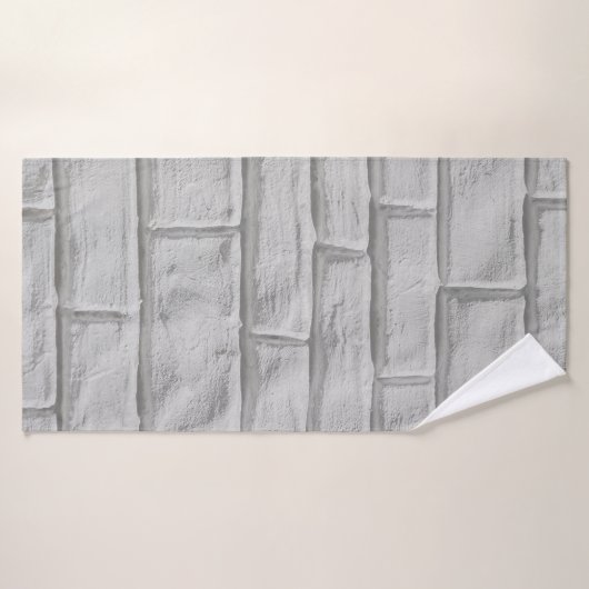 明るい灰色または白のレンガの壁の面のテクスチャを背面に戻す バスタオル (バスタオル)