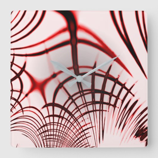 明るい背景に交差する赤い曲線のトレース スクエア壁時計 (正面)