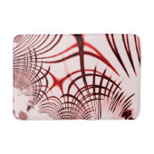 明るい背景に交差する赤い曲線のトレース バスマット (正面)