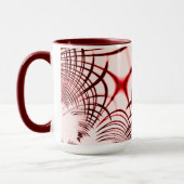 明るい背景に交差する赤い曲線のトレース マグカップ (左)