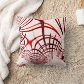 明るい背景に交差する赤と茶色のカーブ クッション (ブランケット)