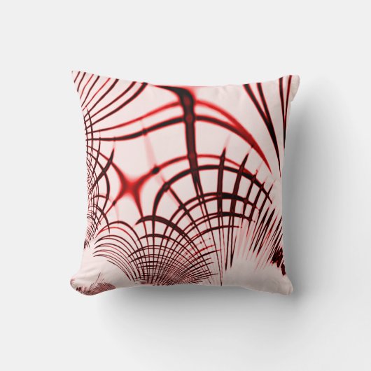明るい背景に交差する赤と茶色のカーブ クッション (正面)