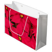 明るい色のクリスマスポインセチアの束 ラージペーパーバッグ (正面アングル)