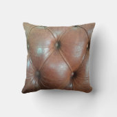 明るい茶色のレザーソファの表面、テクスチュレアブソラ クッション (裏面)