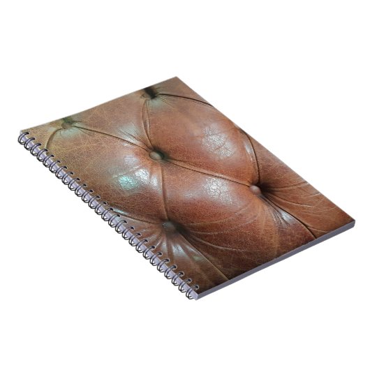 明るい茶色のレザーソファの表面、テクスチュレアブソラ ノートブック (右側)