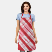 明るい赤とピンクのホリデーキャンディーケーンプレイド エプロン (着用した状態)