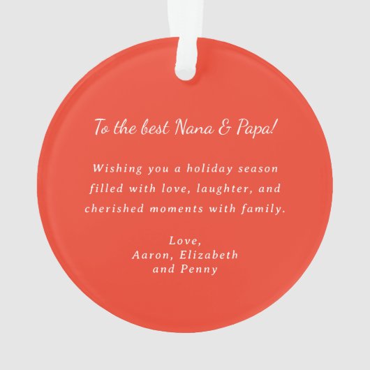 明るい赤のポインセチアと緑のクリスマスフォト オーナメント (裏面)