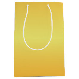 明るい金属製の金ゴールドベル ミディアムペーパーバッグ