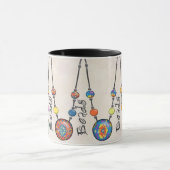 明るく着色されたビーズが付いているマグ マグカップ (中央)