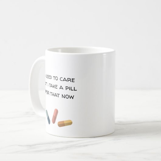 昔は気にあったが今は丸薬を飲む コーヒーマグカップ (正面左)