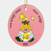 星のクリスマスオーナメントを飾った漫画の天使 セラミックオーナメント (左)