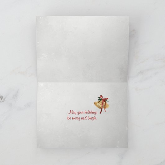 星の形の魚にクリスマスのサンタ帽を被せたものが砂の上に シーズンカード (内部)