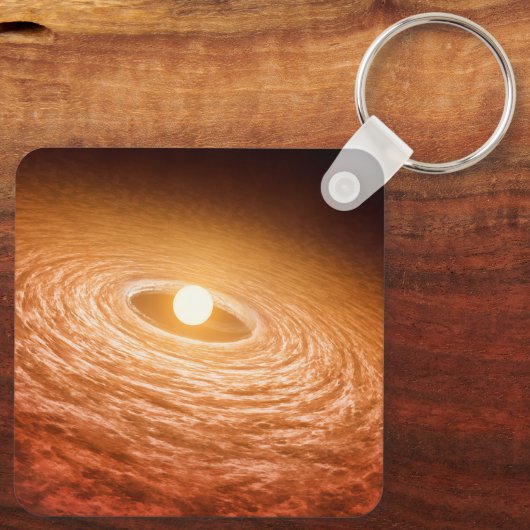 星フーオリオニスを取り巻く材料のディスク。 キーホルダー (裏面)