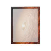 星フーオリオニスを取り巻く材料のディスク。 ノートパッド (回転)