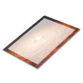 星フーオリオニスを取り巻く材料のディスク。 ノートパッド (アングル)