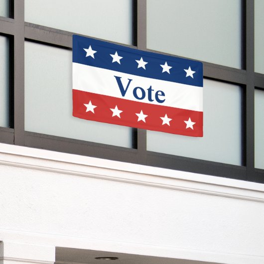 星付き赤と青の投票 横断幕 (ビルの外側)