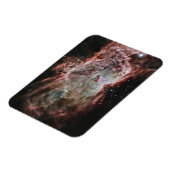 星団は炎の星雲の中心にある。 マグネット (左側)