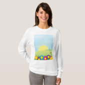 春の牧場の太陽光とカラフルな花 Tシャツ (正面フル)