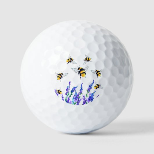 春の花とビー飛んでいるズゴルフボール ゴルフボール (正面)
