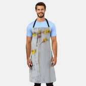 春黄色の花、白い板の装飾。 エプロン (着用した状態)