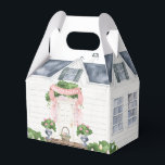 春 |ハッピーイースター |ハウス フェイバーボックス<br><div class="desc">この春ハウスの好意ボックスであなたのイースター卵の狩りであなたの友人を驚かせる。フロントポーチにイースターバスケットが付いた水色のフロントドア。背面には、登山バラで飾られたカップルの窓がある。使用される色は、オリーブグリーン、ピンク、グレー、ブラウン。ドアの上にあるピンクのバ読ナーは「ハッピーイースター」が、この文字は編集できる。</div>