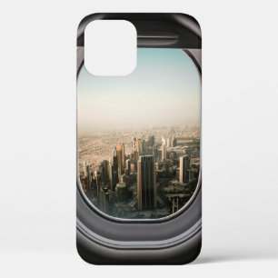 昼間の都市の飛行機の窓からの眺め iPhone 12ケース