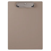 時計が掛けられた茶色の壁 クリップボード (正面)