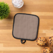 時計が掛けられた茶色の壁 鍋敷き (トップダウン)