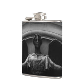 時計に当たる フラスク (左)