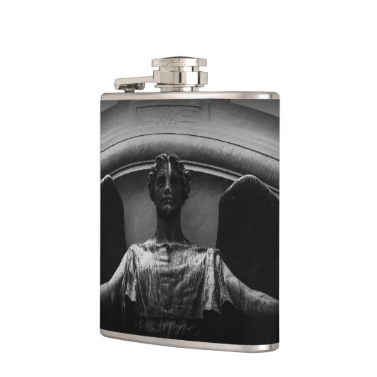 時計に当たる フラスク (左)