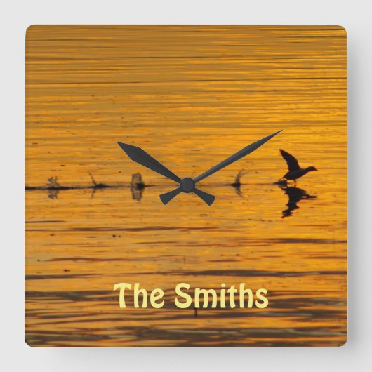 時間飛んでいる枠を抜ける スクエア壁時計 (正面)